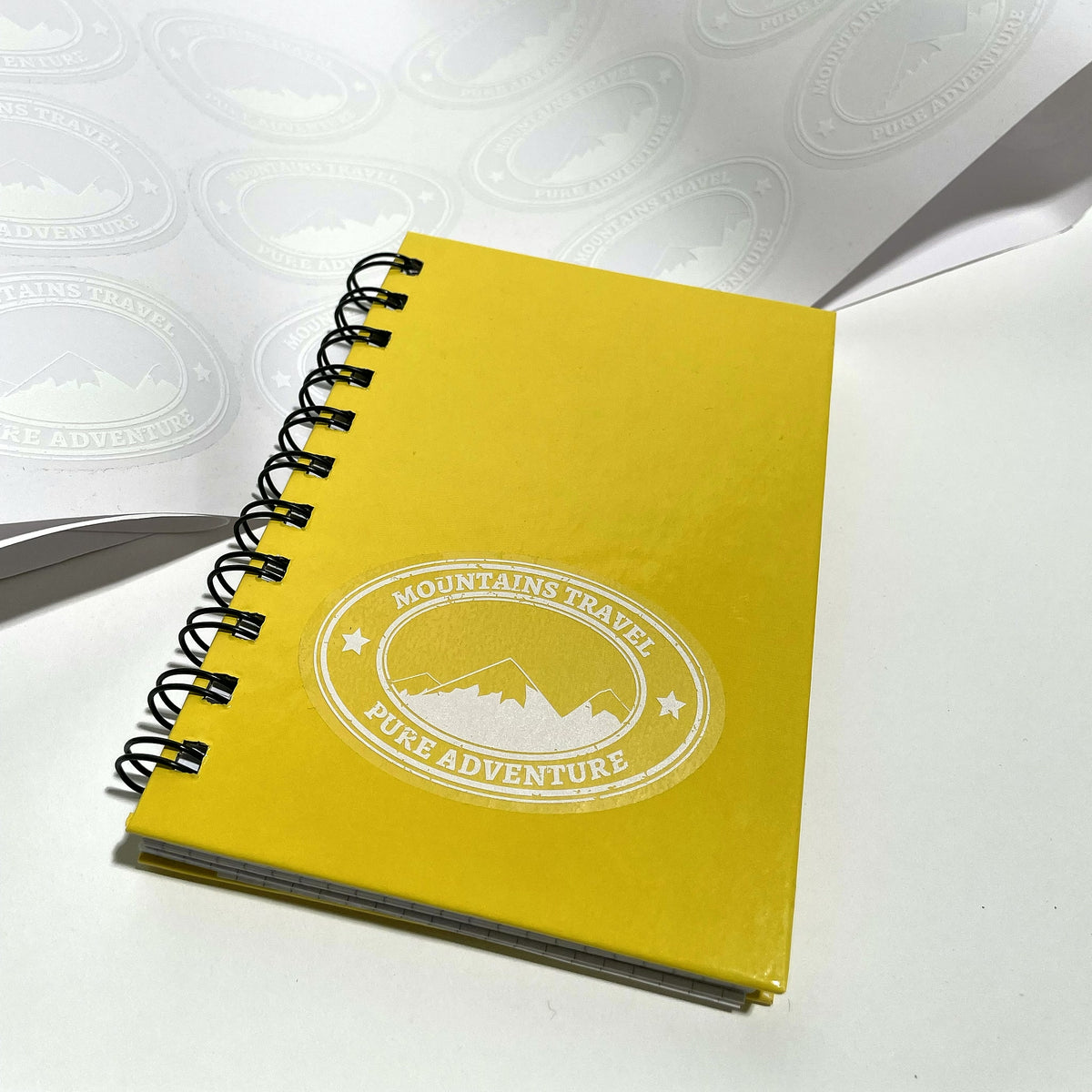 Clear labels with white underprint, roll and applied sample