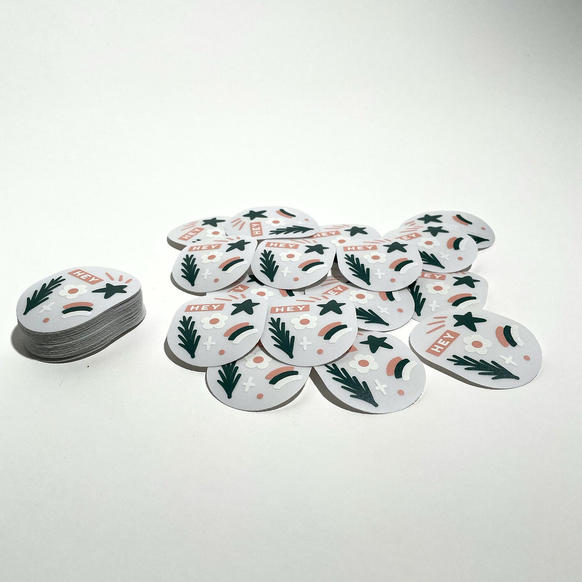 Round white matte labels laid out flat